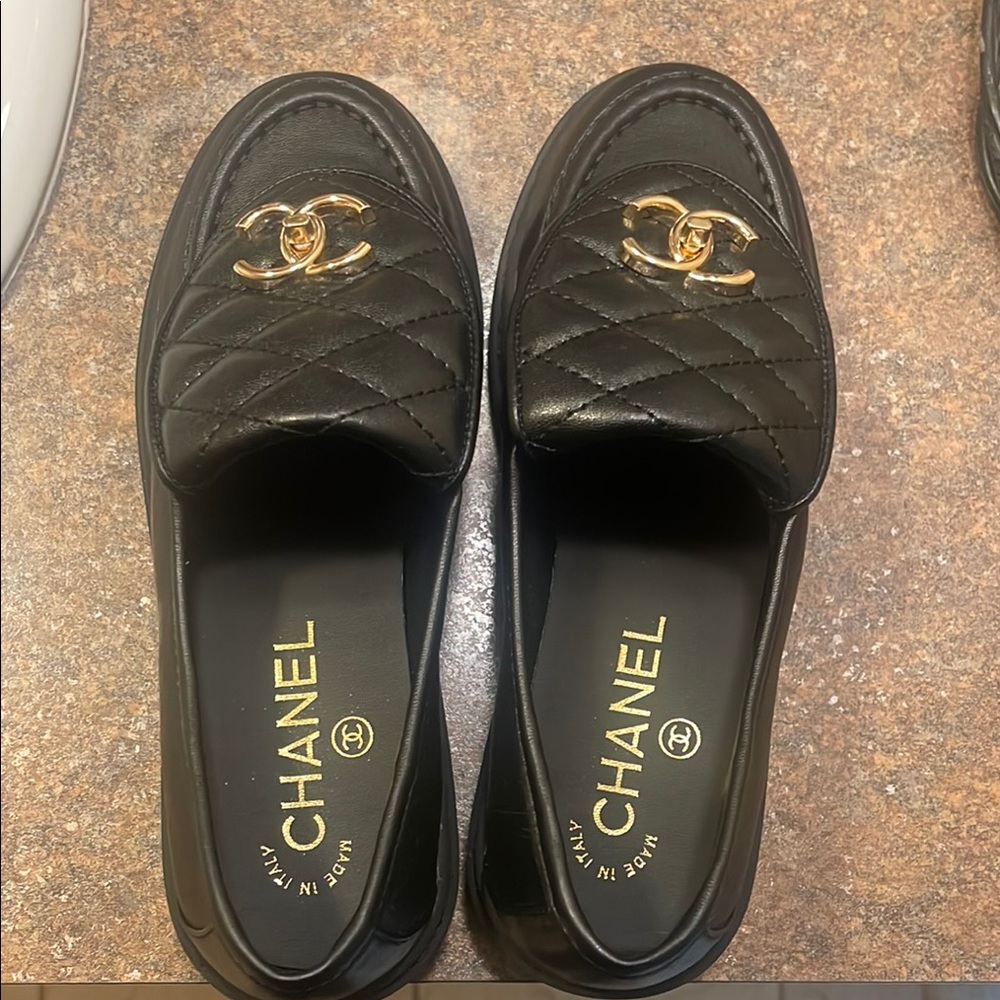 Chanel Black Quilted Loafers with Gold Accents